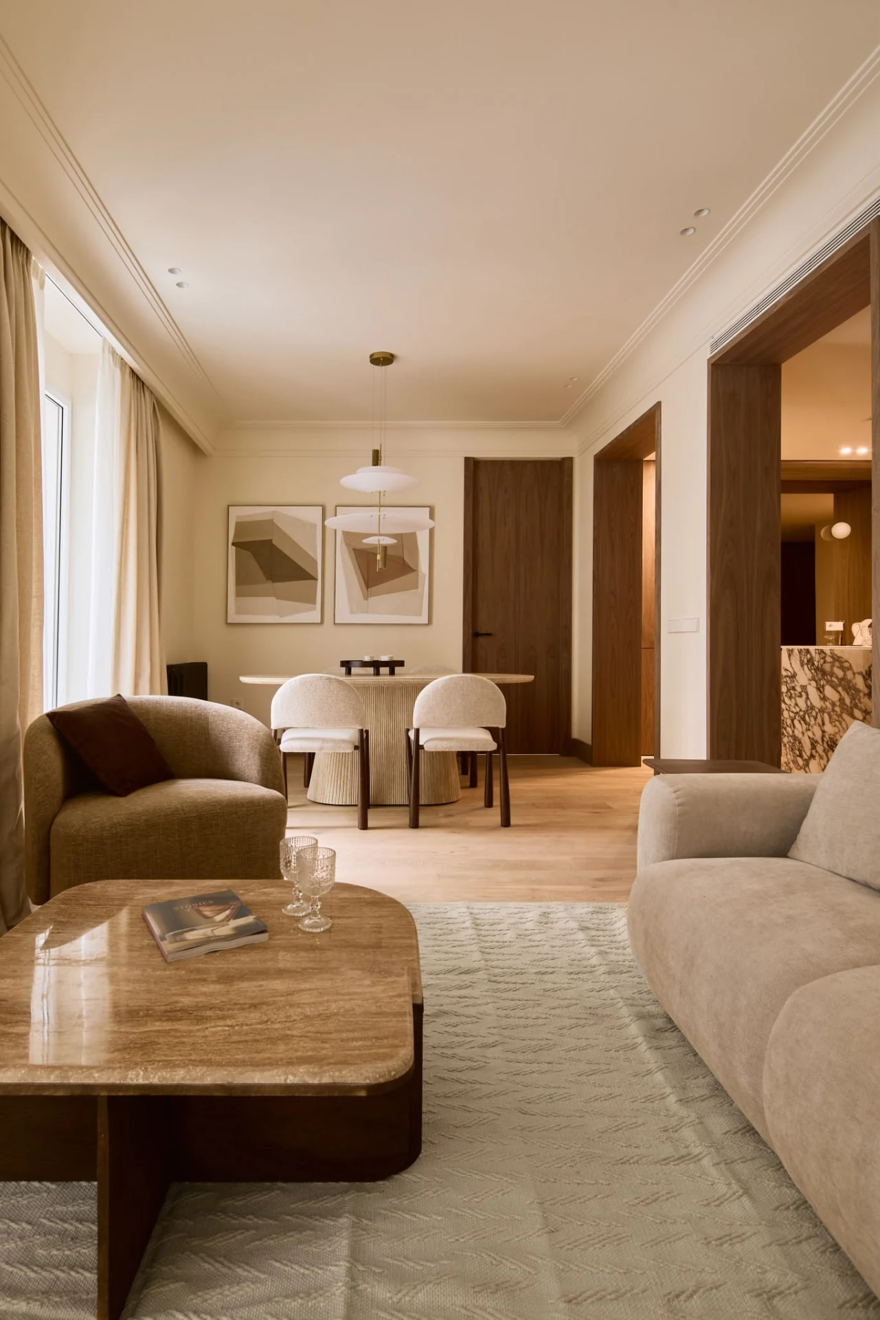 Portrait view of the furnished living and dining room