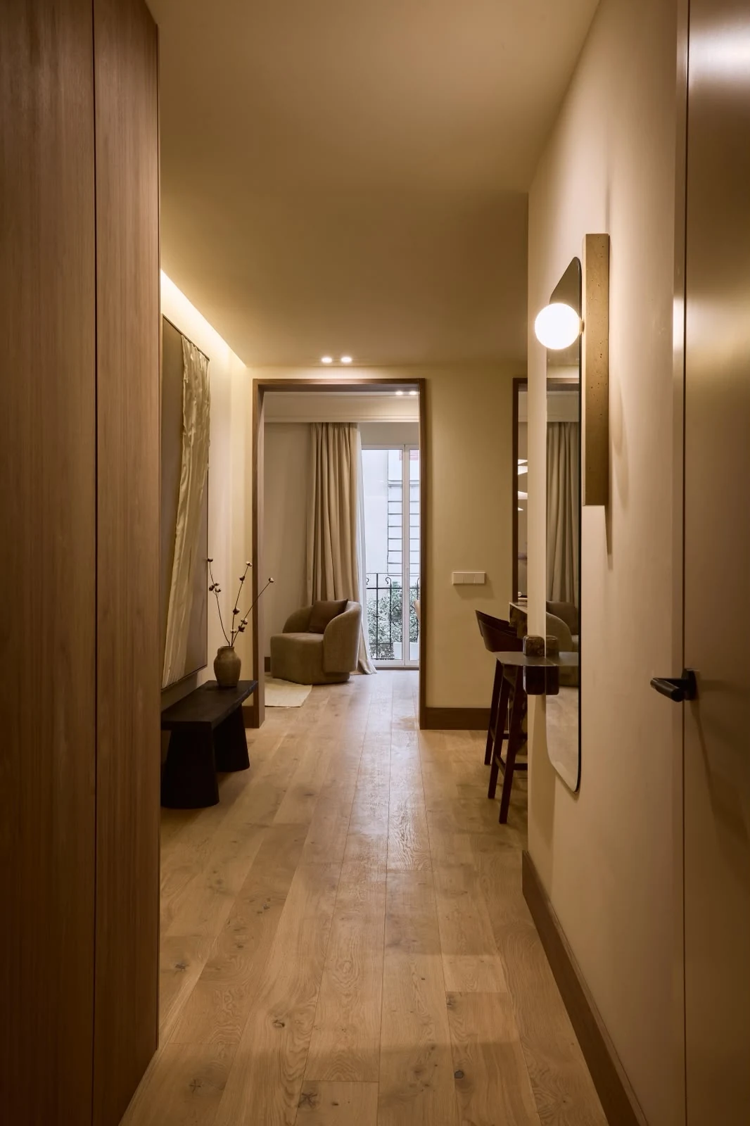Apartment hallway with ceiling lighting