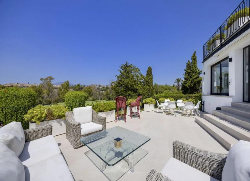Terraza con mobiliario de exterior
